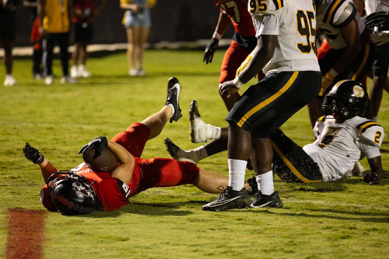 Hartsville wide receiver Jackson Moore slides into the end zone with the ball to score in the fourth quarter, threatening the Irmo lead.