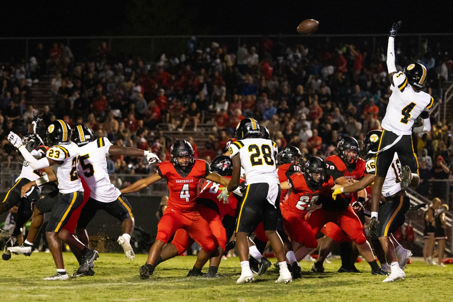 The Yellow Jackets attempt to block a punt in the third quarter.