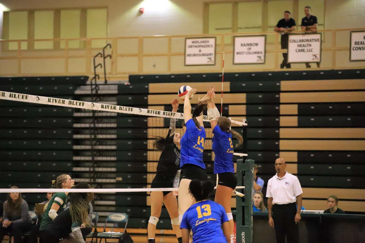 River Bluff’s Caroline Tucker makes a play at the net during the 3-0 loss to Lexington.