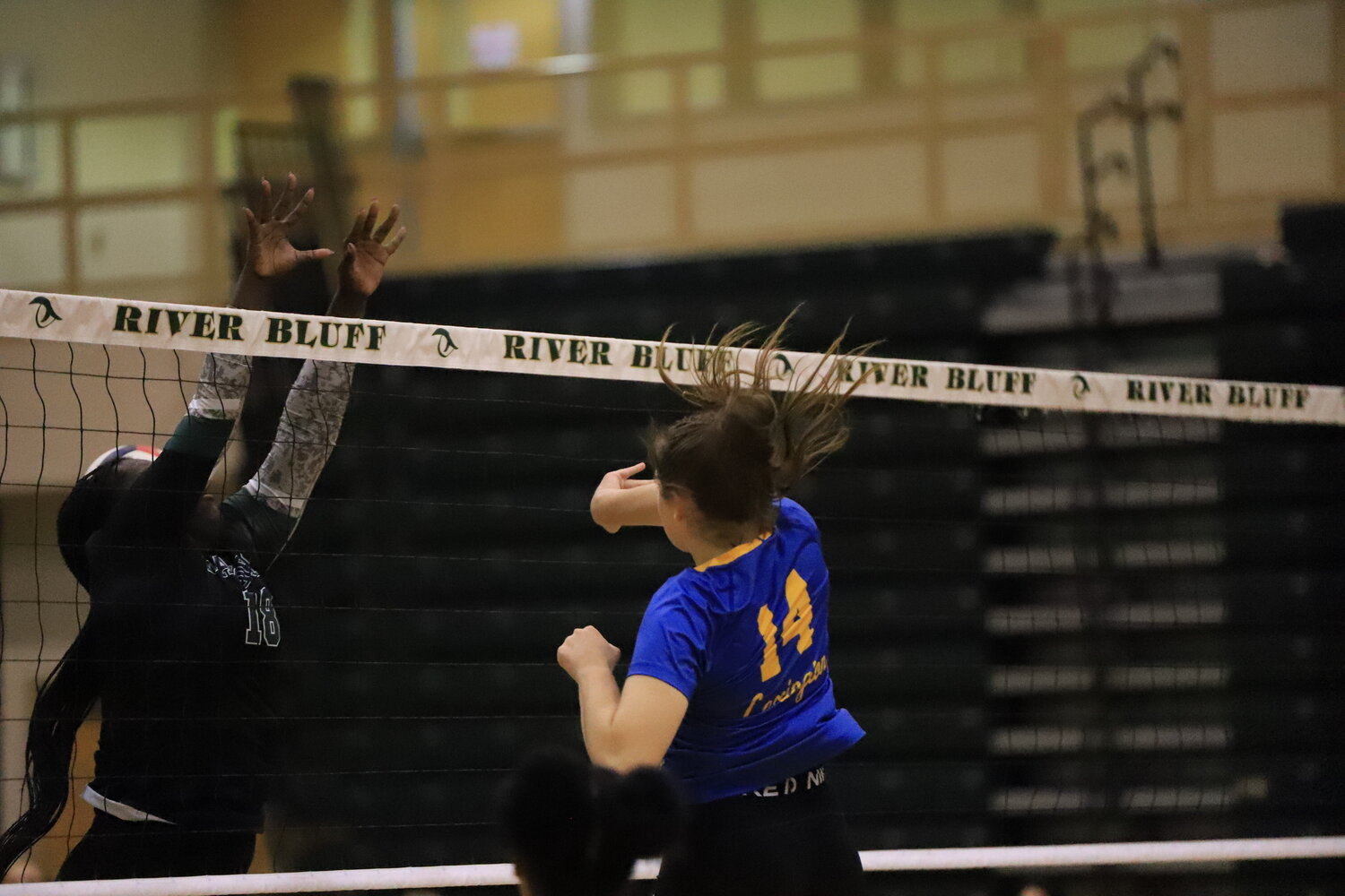 Lexington's Kaitlyn Cannon makes a play at the net during Lexington's big win over River Bluff.