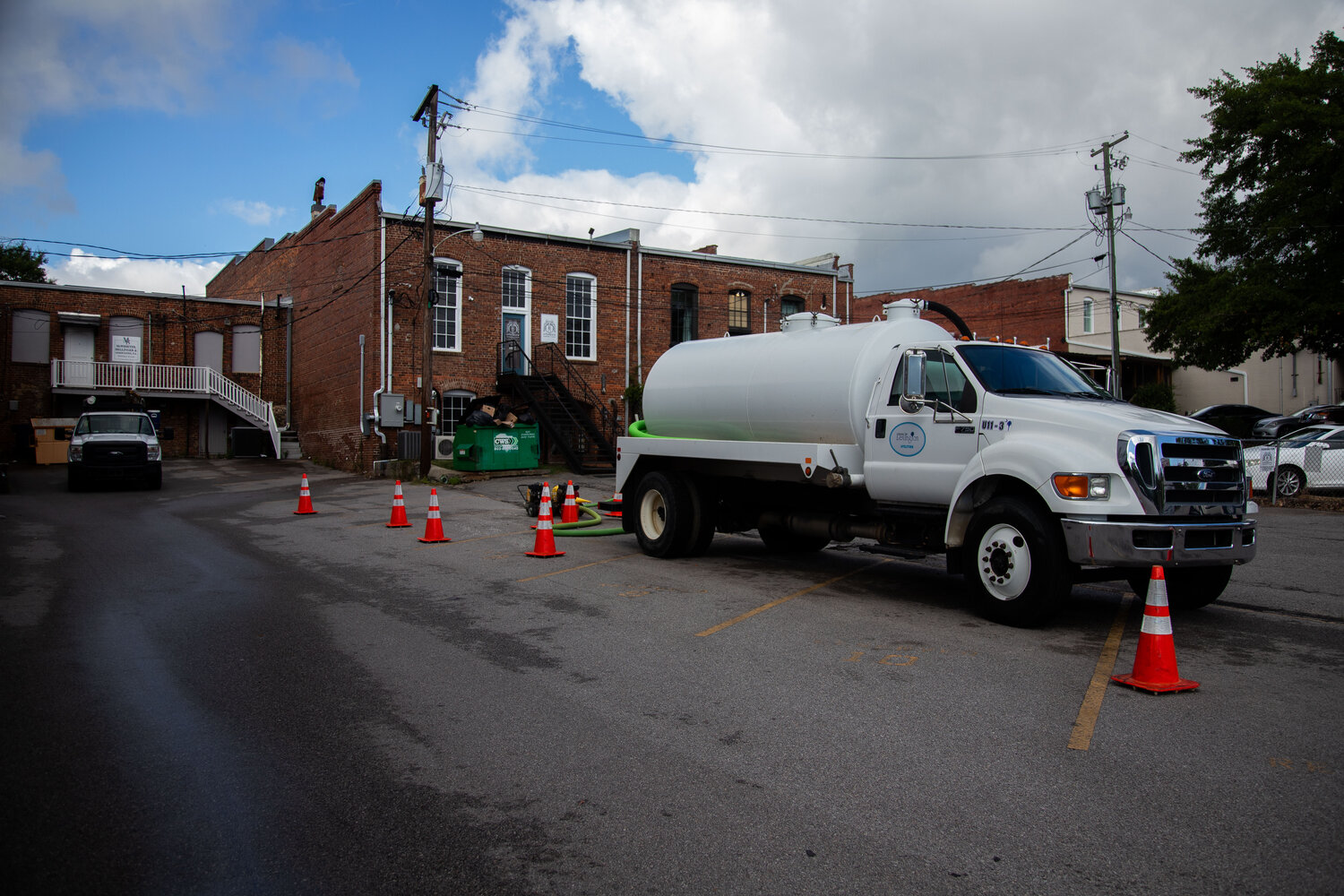A sewage truck has been pumping 24/7 since March in downtown Lexington as the town works to get access to the property where it needs to fix a line.