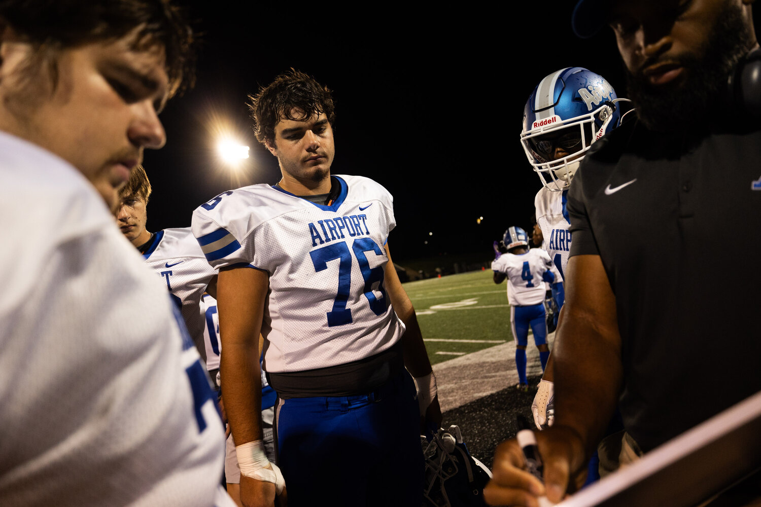 Airport Eagles offensive lineman Dylan Barbrey receives instructions in between drives against the Irmo Yellow Jackets.
