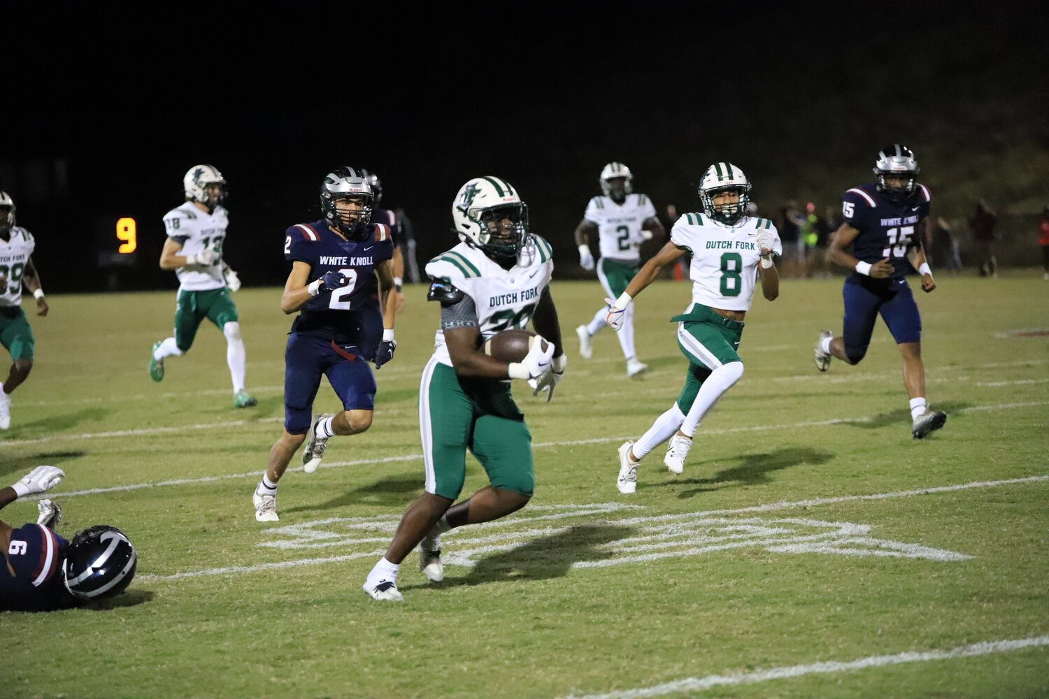 Dutch Fork's Maurice Anderson runs back a kickoff for a touchdown against White Knoll.