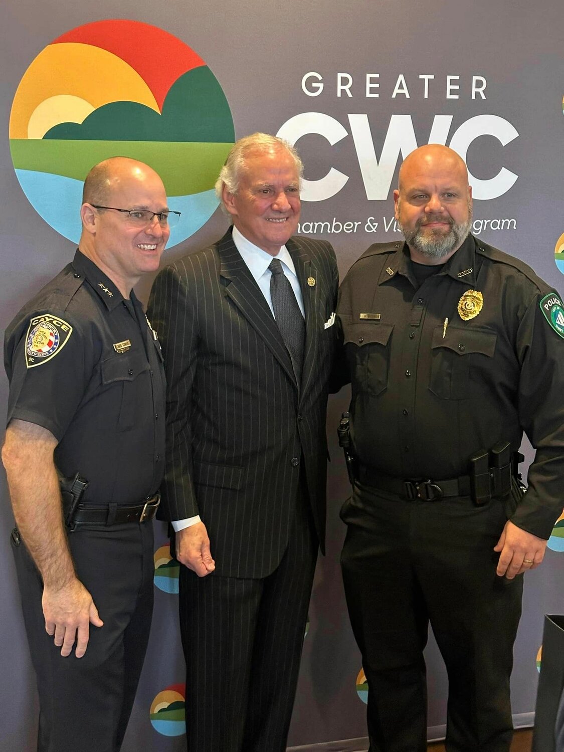 Gov. Henry McMaster (center) poses with Cayce Police Chief Chris Cowan (left) and West Columbia Police Chief Marion Boyce at the Greater Cayce-West Columbia Chamber’s Business Breakfast Meeting Nov. 28.