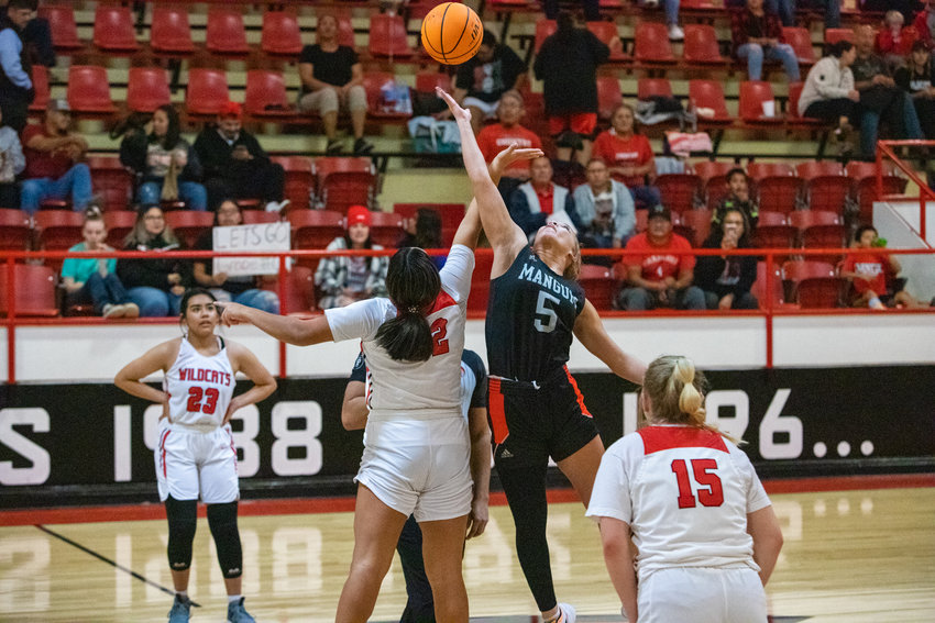 Lauryn York tips off in the Lady Tigers Dec. 16 game vs. the Lookeba&mdash;Sickles. Mangum lost 70-28.