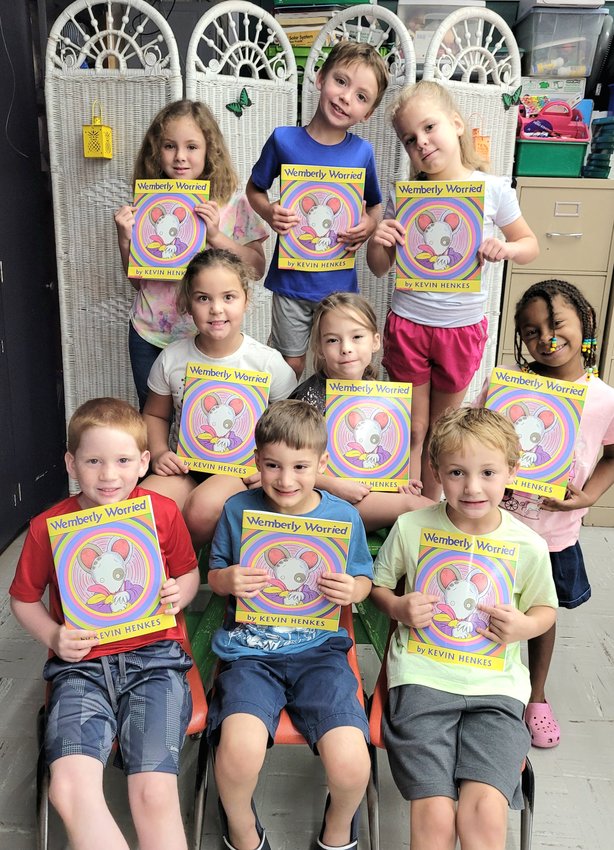 Mrs. Lanning's K+ Class would like to say a heartfelt thank you to Pam Simmons and Wichita Insurance and American Farmers and Ranchers for giving the gift of literacy.  Pam and her Insurance Company have thoughtfully adopted the K+ Class to help promote a love of reading.  They will be purchasing a book each month for the students to keep and start their own library at their homes.  The students were so excited to receive their first book, &quot;Wimberly Worried&quot;.   This is a wonderful and valuable partnership.  Mrs. Lanning and her K+ class are very grateful for Mrs. Simmons and Wichita Insurance.