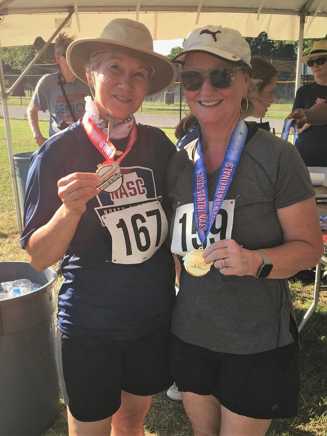 Kathy Smith (left) and Annette Fenech recently participated in the 1,500 Powerwalk for their age group at the Tennessee Senior Olympics. Fenech took gold in the event, while Smith took silver.