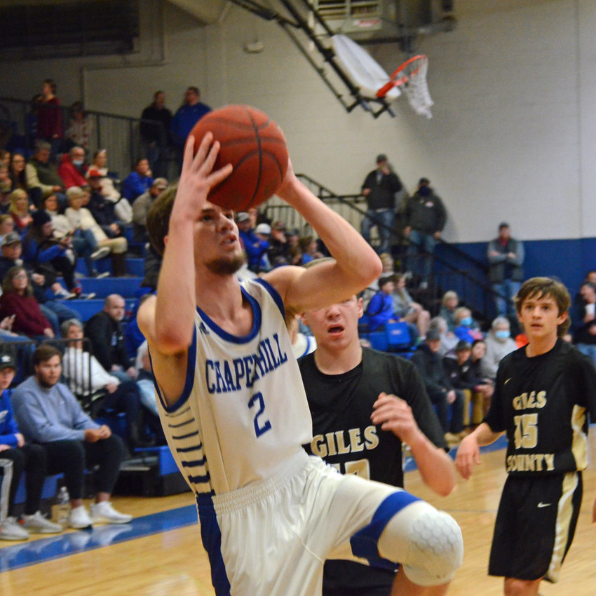 Senior Cole Perryman (2) drives to the hoop and gets fouled in the first half.