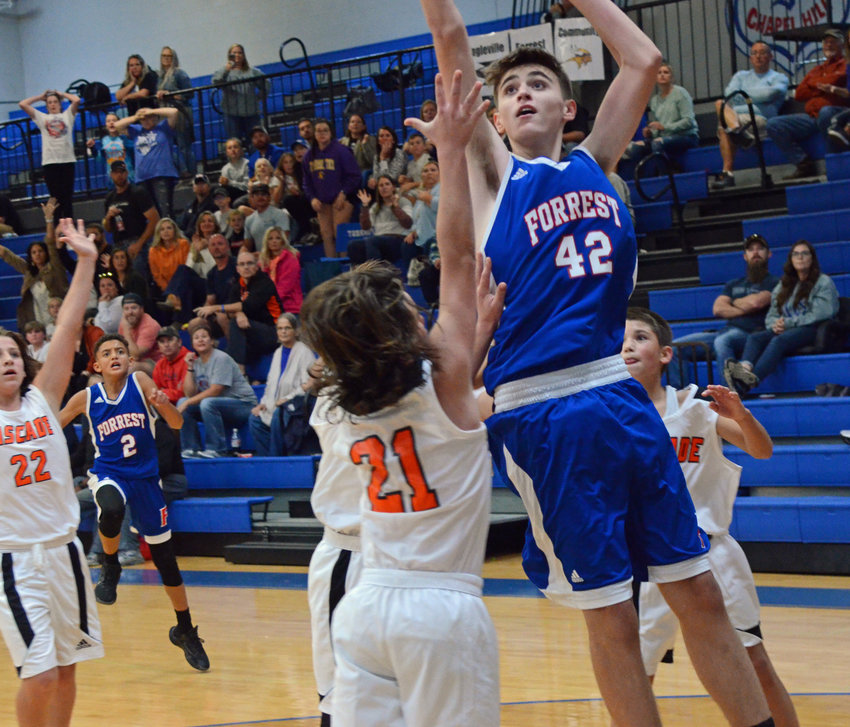 Josh Doud nails the game-winning shot at the buzzer to beat Cascade 36-34 and send the FMS Rockets to the World Tournament championship game versus Eagleville Saturday night at Chapel Hill at 7 p.m.