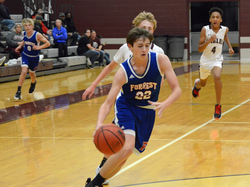 Eli Bell (22) had seven points to lead the FMS Rockets in the scoring column Monday night at Eagleville.