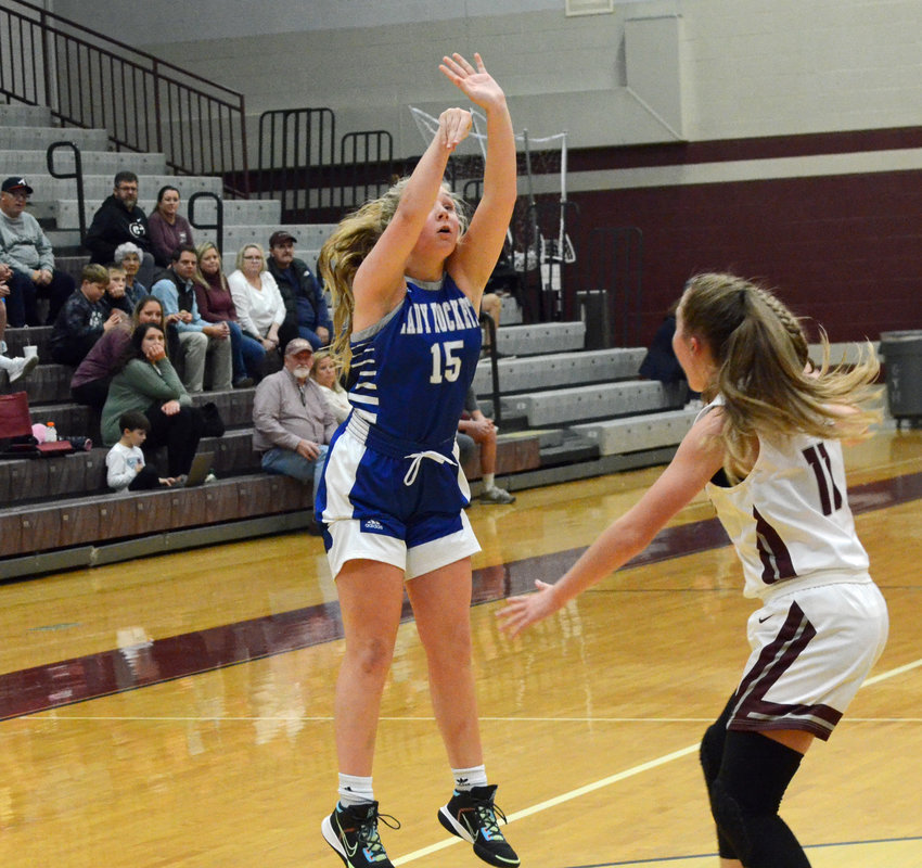 Josie Brown (15) puts up a jumper for the Lady Rockets, who beat Eagleville 28-13 Monday night.