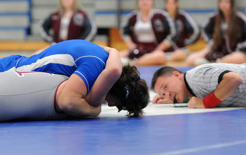 Eli Alexander pins his opponent from Spring Hill just 17 seconds into the match.