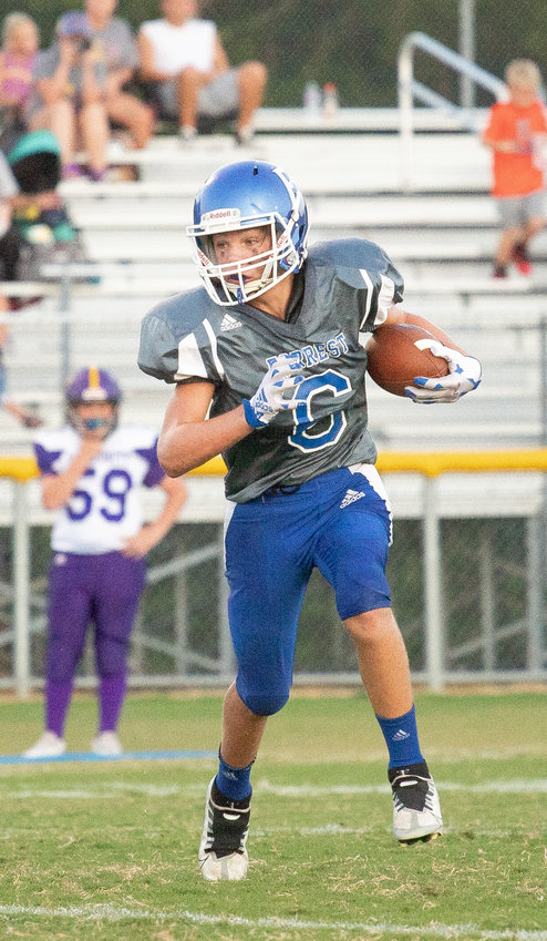 Tristan Goad carries the ball for the Rockets.