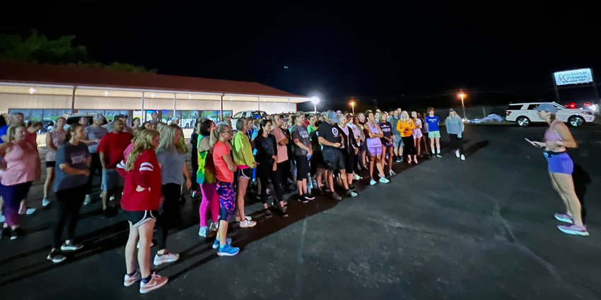 Runners gather to honor the life of Liza Fletcher, whose life was taken during a pre-dawn run on September 2.