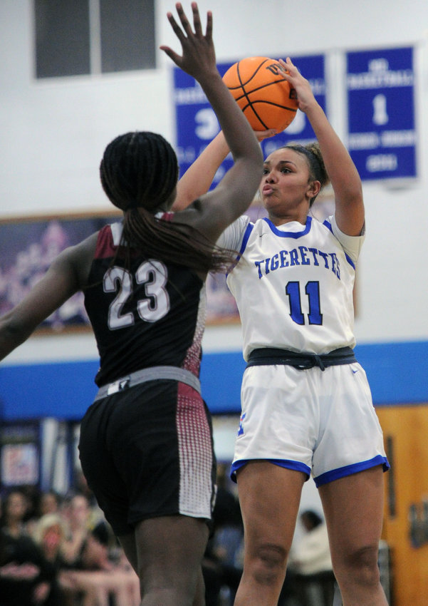 Demiyah Blackman pulls up for a mid-range jumper. She scored eight points for the Tigerettes on Friday night.
