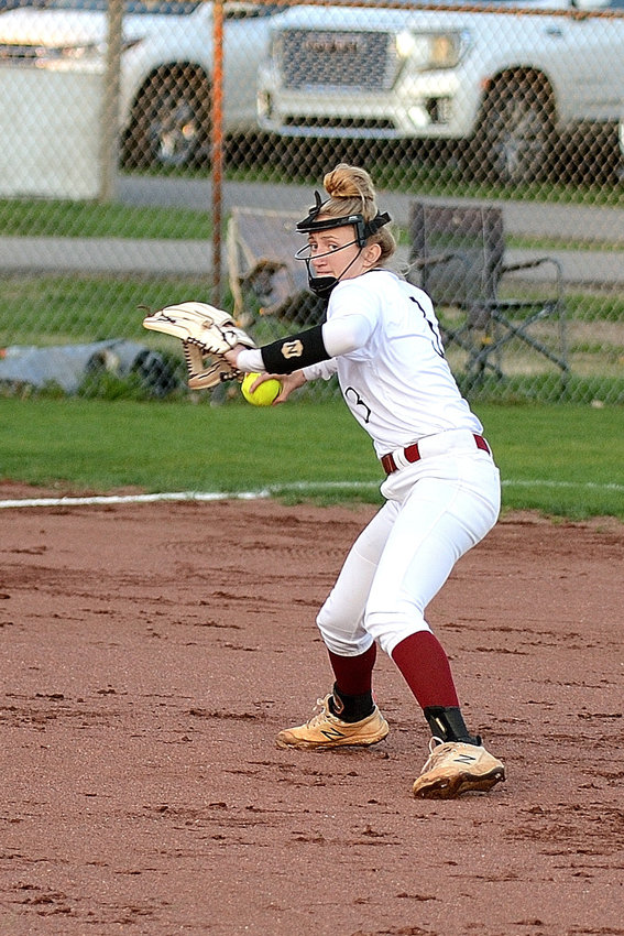 Alicia Polk fields a ball and fires the throw to first for the out on Monday night against Community.