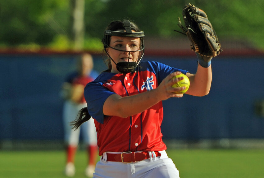 Taylor Moreland delivers a pitch against Community in a key District 7-AA battle. She tossed a complete game shutout and earned the win from the pitcher&rsquo;s circle.