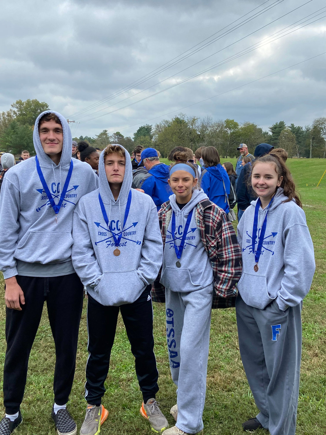 Forrest’s Top 10 region medalists from left are CJ Sanchez (4th), Tyler Baxter (8th), Jaedyn Stalnecker (2nd), and Justina Mosley (7th).