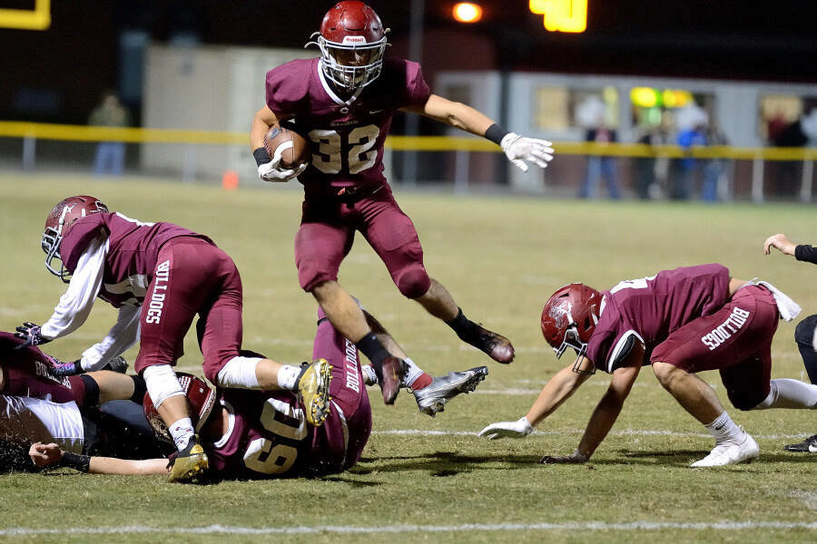 Cornersville senior running back Brady Calahan (32) had a huge game in the Bulldogs’ comeback win over the Eagles, rushing for 173 yards, two touchdowns, and three two-point conversions Friday night in Frog Bottom.