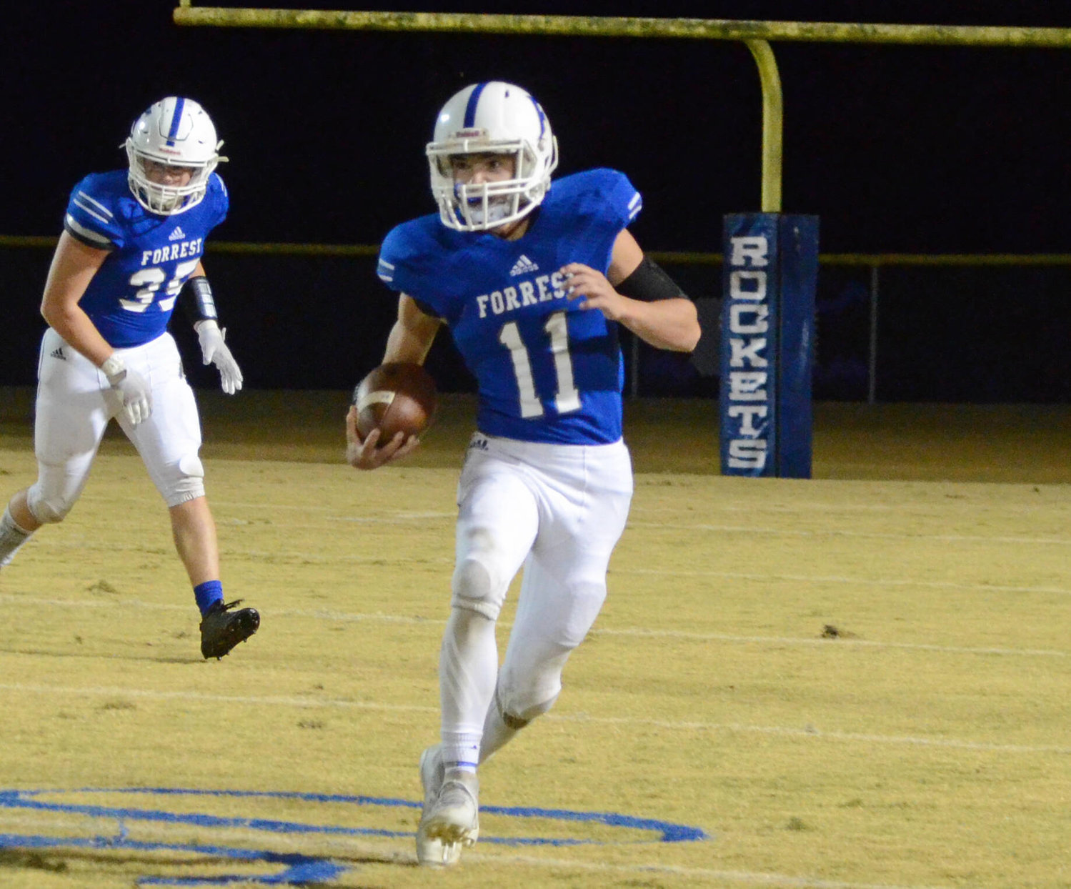 Brenton Burchell (11) comes up with a nice punt return to give the Rockets good field position in the second quarter.
