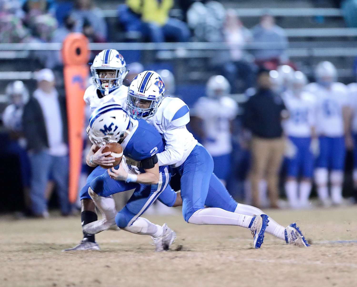 Marshall County’s Lamrion Pierce comes up to make a solid tackle on a Macon County receiver.