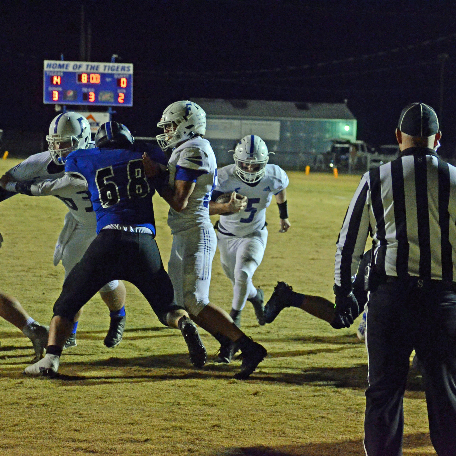 Forrest quarterback Max Kirby (5) gets the Rockets on the board with a 1-yard second quarter touchdown.
