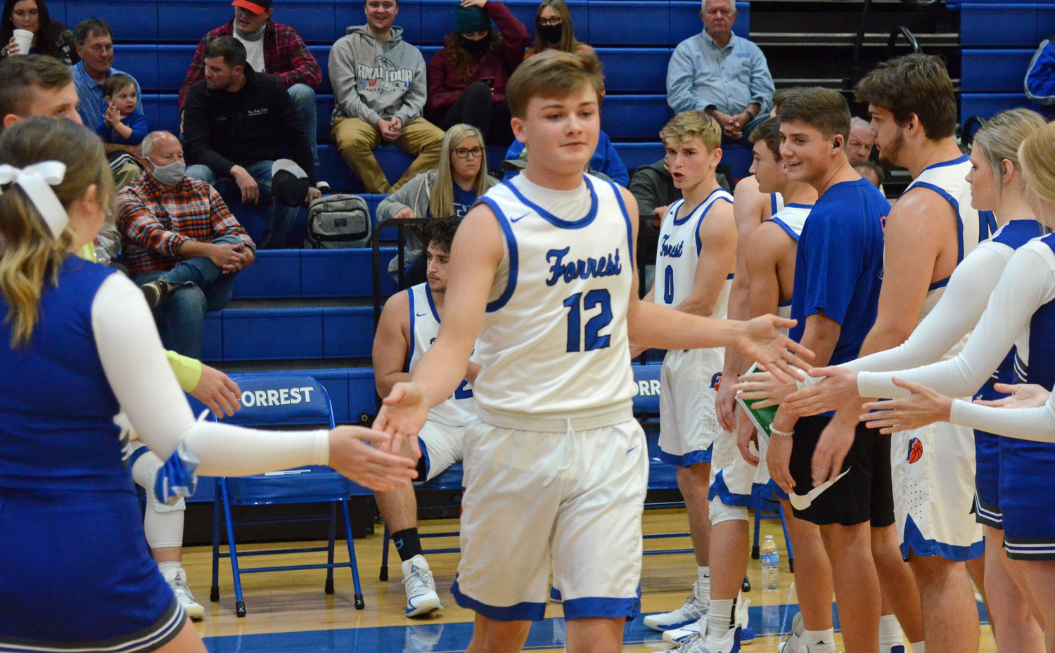 Freshman Brennan Mealer runs out before turning in a stellar varsity debut with 18 points and a game-high four 3-pointers.