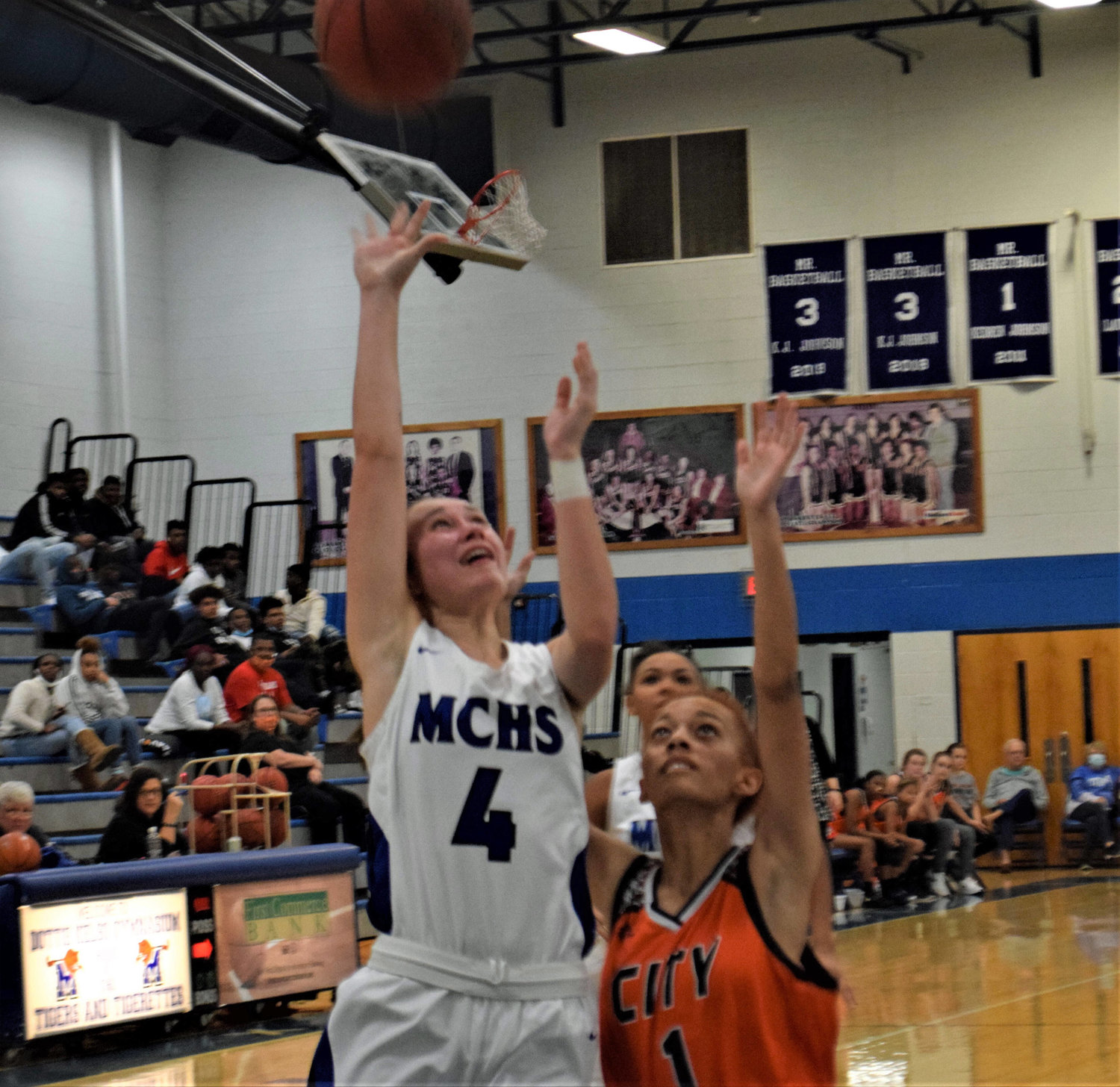 Senior Karlye Wiser (4) soars in for a layup for two of her team-high eight points versus the Lady Tigers.
