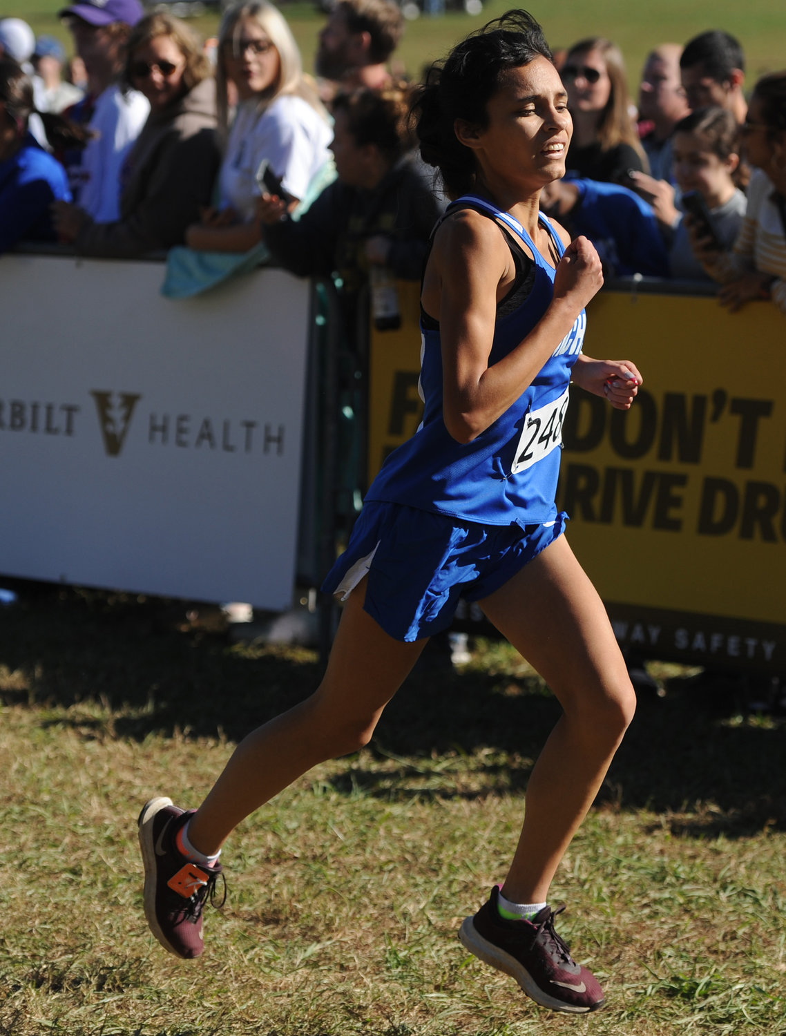 Lydia Molina charges towards the finish line in the Girls Class A-AA race.