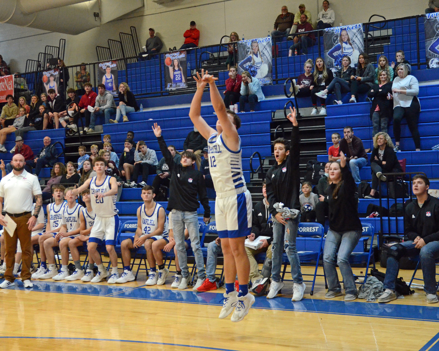 Brennan Mealer nails a 3-pointer at the beginning of the fourth quarter.