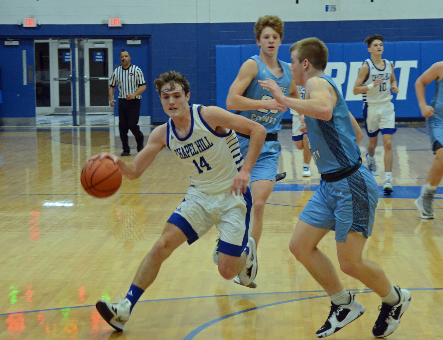 Hunter Bennett (14) led the Rockets in the scoring column with 11 points Tuesday night versus Moore County.