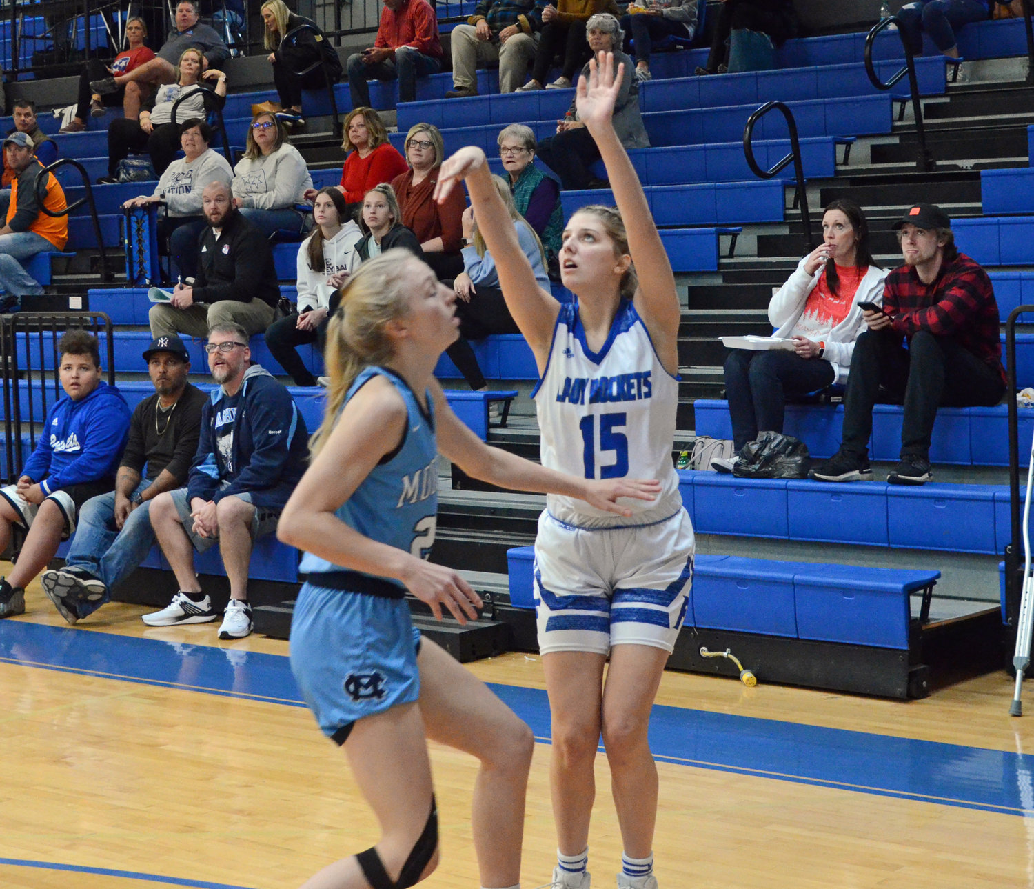 Forrest’s Megan Mealer (15) buries a 3-pointer to give the Lady Rockets a 6-2 lead Tuesday night at Chapel Hill.