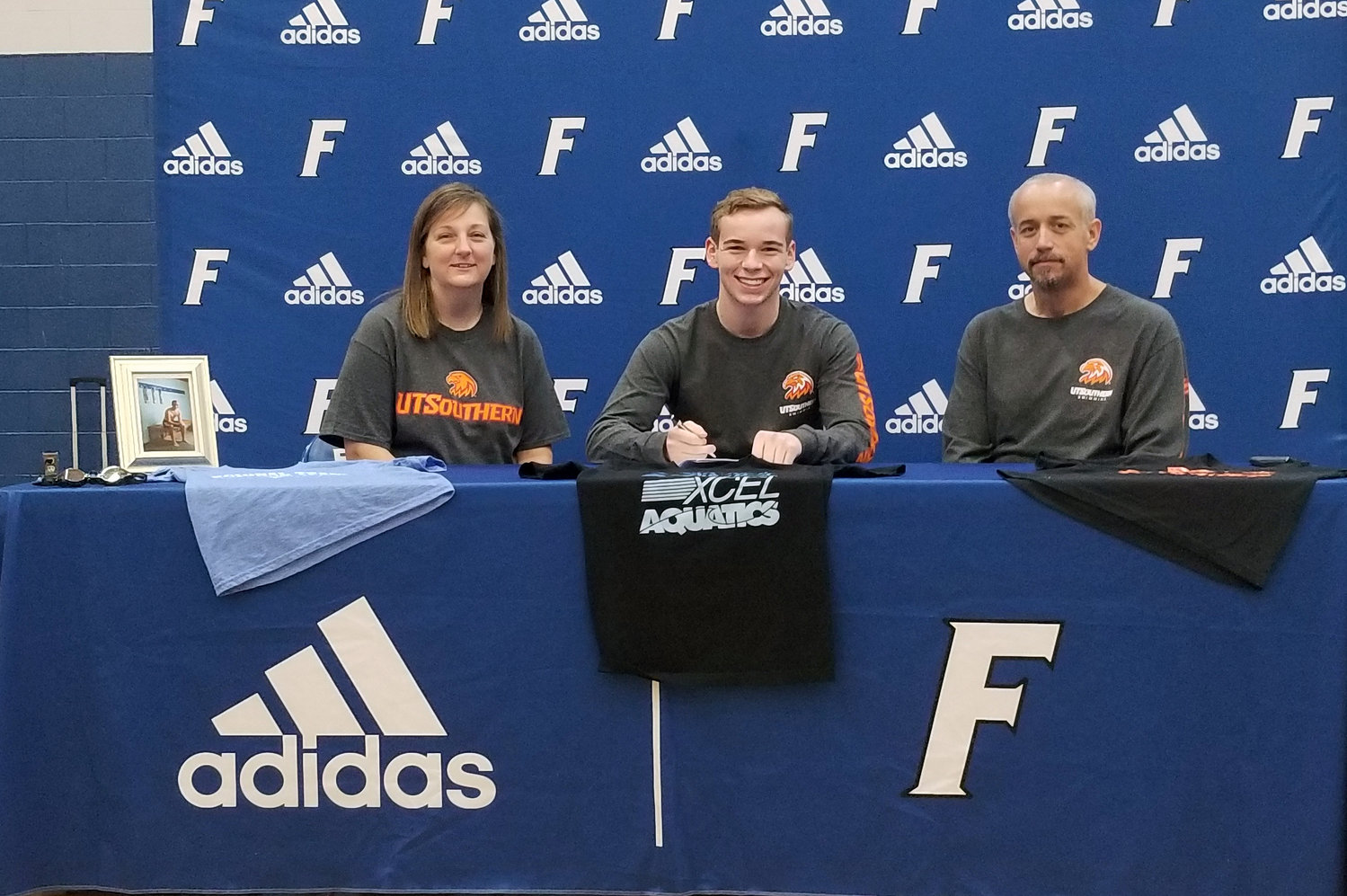 Hayden Milligan is joined by his family as he signs his letter of intent to swim for UT-Southern next season. Milligan is the first swimmer from Chapel Hill and the first male swimmer from Marshall County to sign a letter of intent to swim in college.
