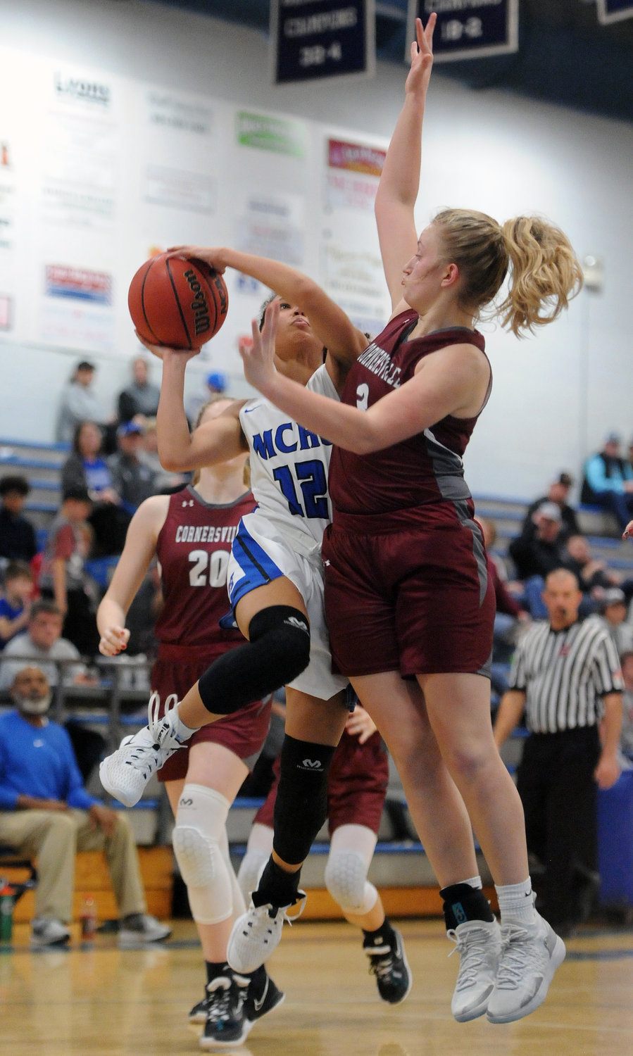 Kayla Keiler drives to the basket and draws the foul against Cornersville. She led the Tigerettes with 13 points.
