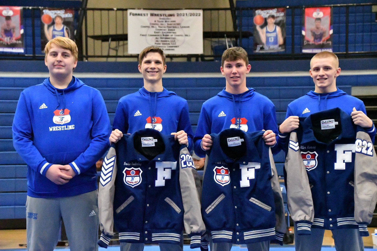 Five Forrest Rockets were recognized Tuesday on Senior Night. From left are Nathan Hall, Braiden Vanderploeg, Forest Ozburn, and Alex Harvey.  Senior Asa Nance was not present.