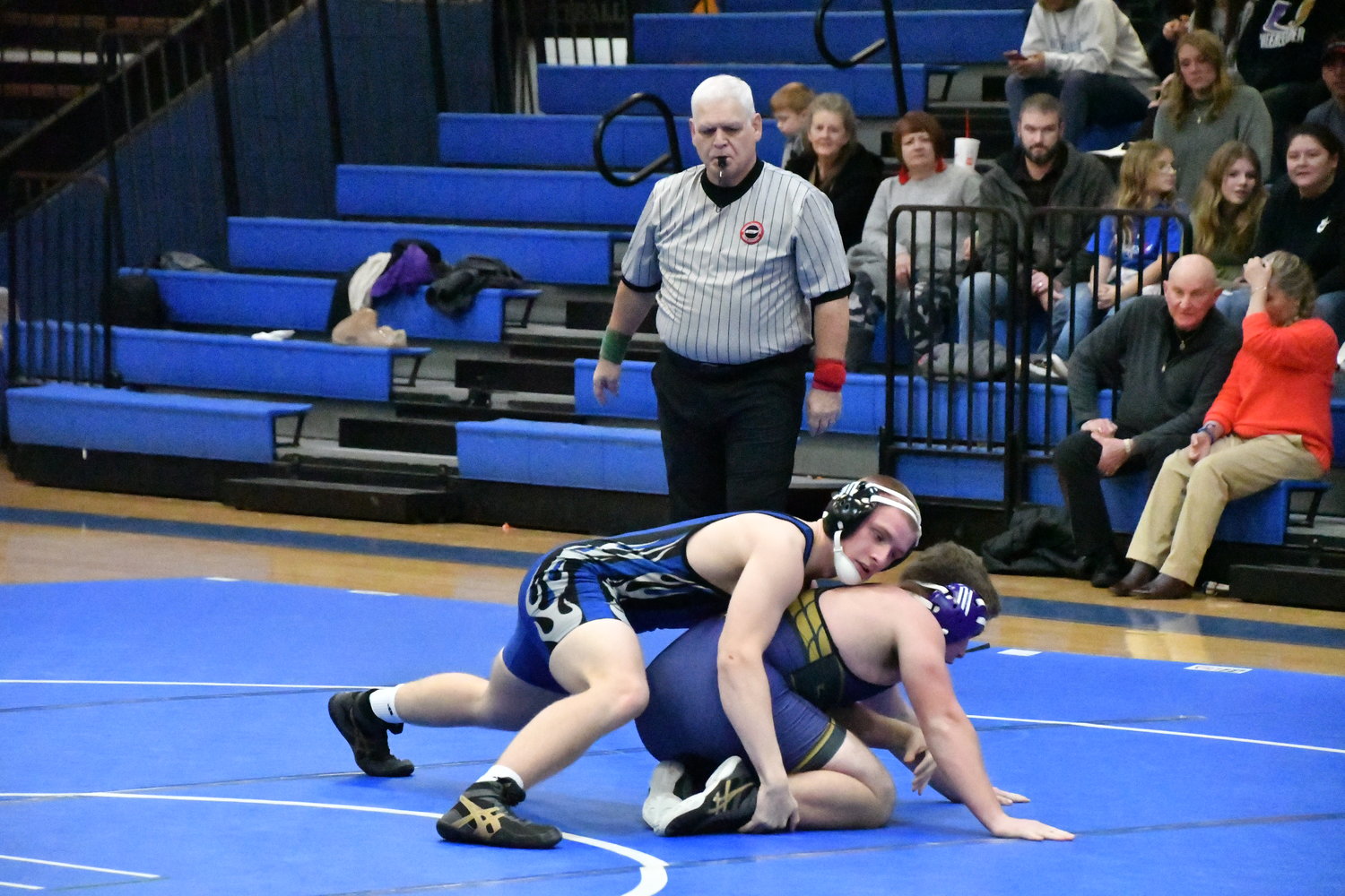 Senior Alex Harvey had two pins during a tri-match against Community and Eagleville Tuesday night.