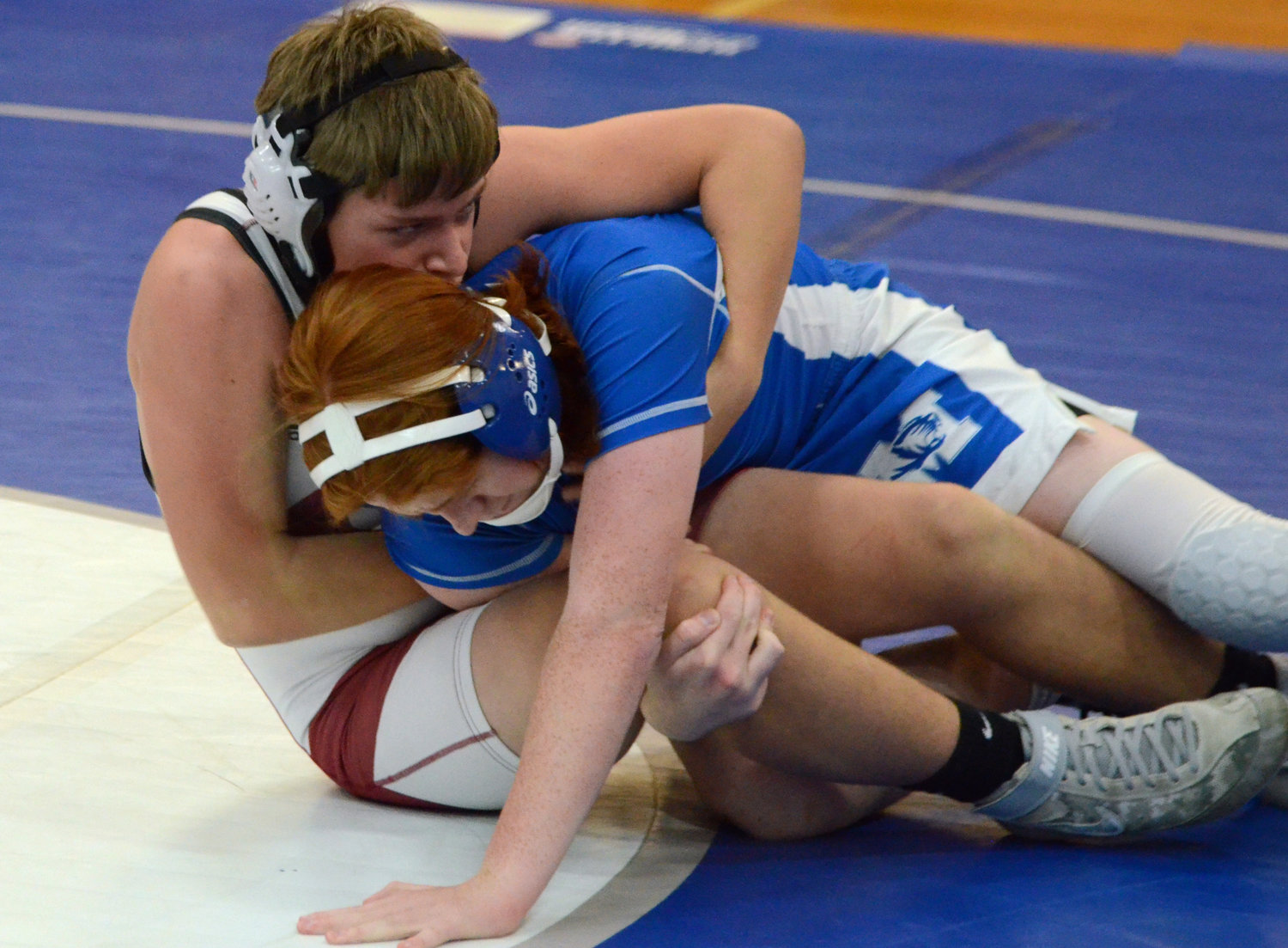 Cornersville’s Caden Bush battles with Ryan Bentley from Marshall County High School in the 138-pound weight class.
