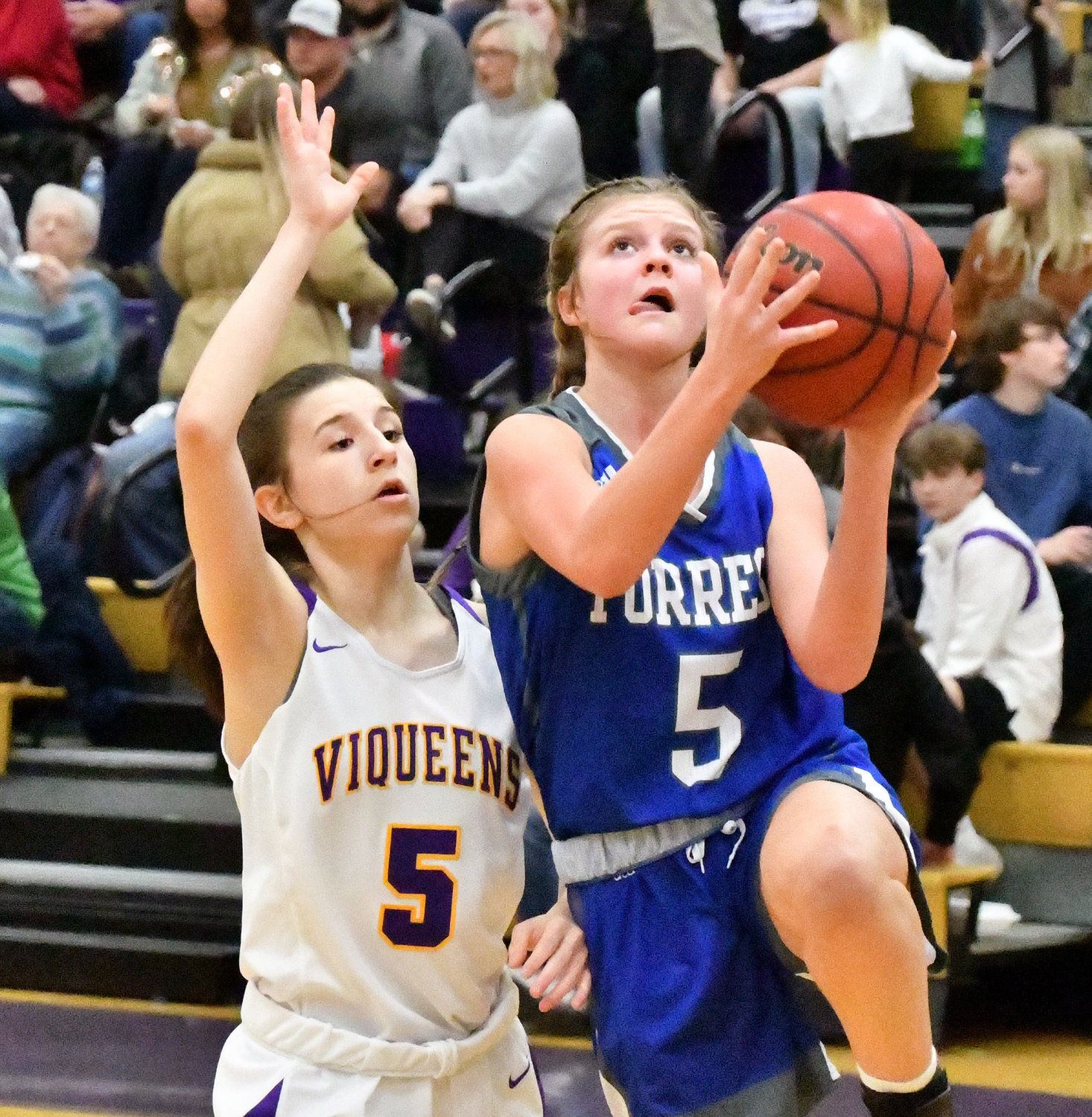 Macyn Kirby (5) drives to the basket for the Lady Rockets.  Kirby led Forrest with 20 points.