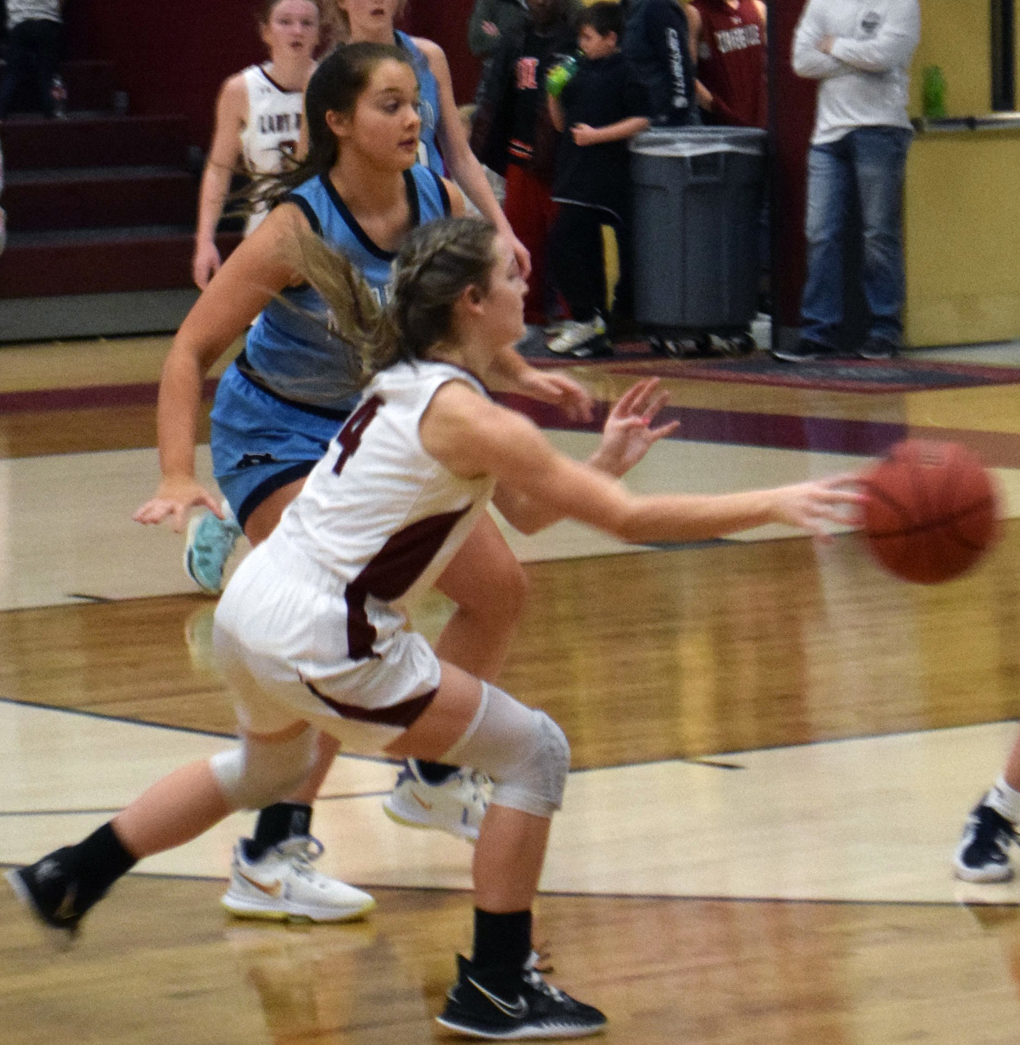 Jayli Childress dishes the ball inside as Cornersville sets up a run at the goal.