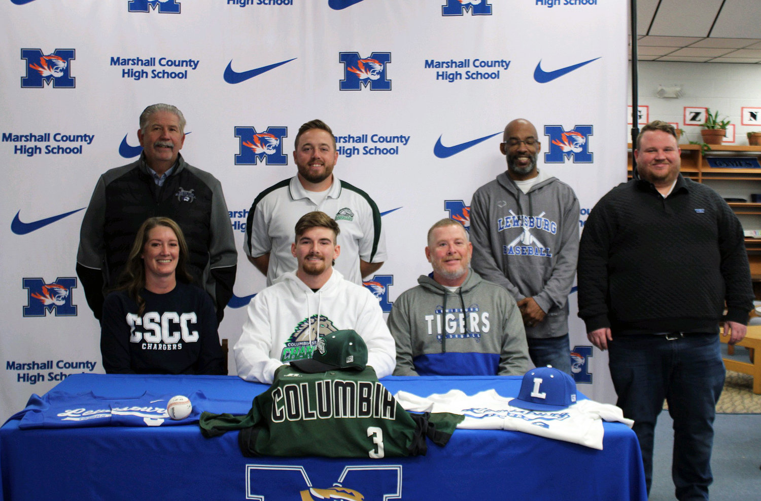 Tristan Griggs signs his letter of intent to continue his baseball career at Columbia State Community College.