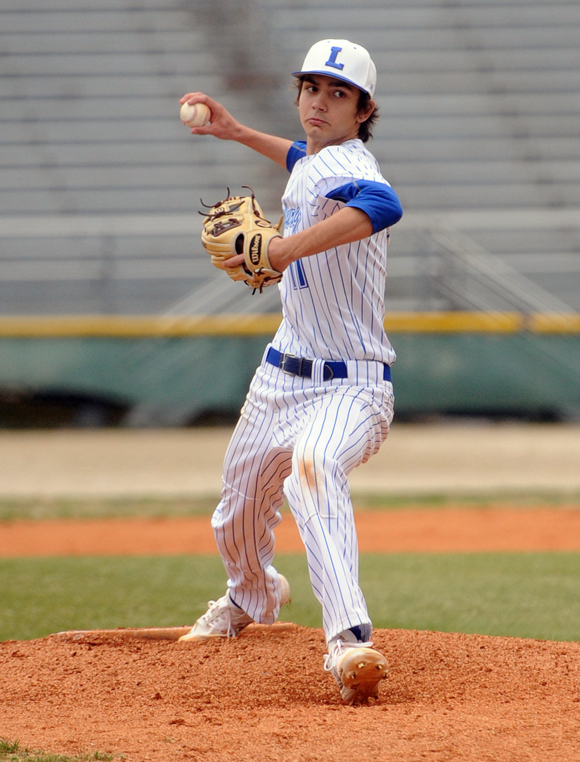 Bailin Luttrell winds up and delivers a pitch against Wayne County on Tuesday.