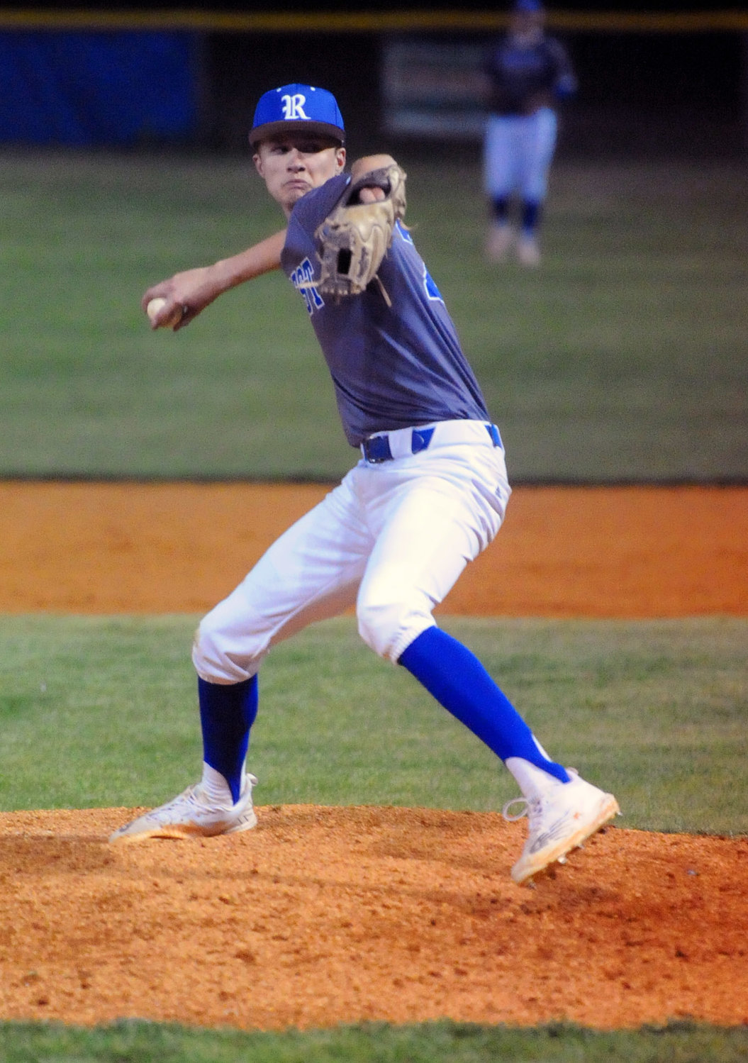 Austin Lampley delivers a pitch while working in relief against Giles County on Monday night.