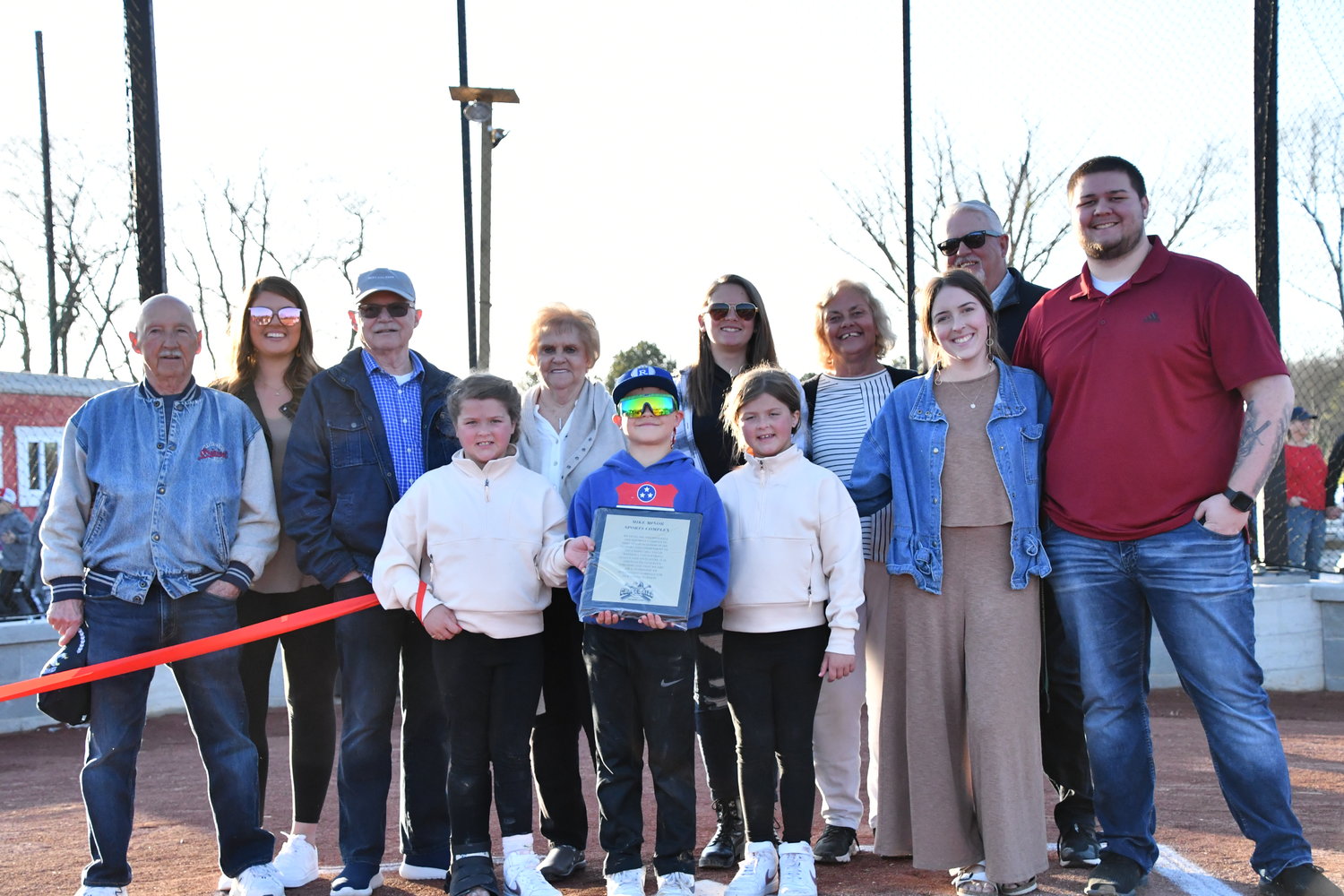 The family of Mike Minor gathers for a photo at the complex which bears the name of the former Forrest High School athlete and current Cincinnati Reds pitcher.