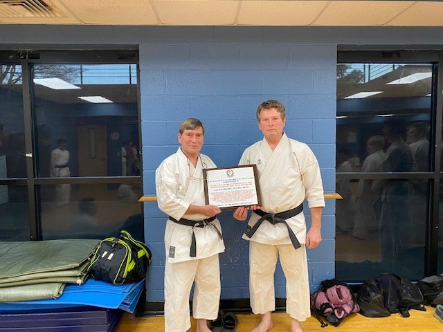 For the second time in the last three years, Lewisburg Wado-Ryu Karate School was the winner of the Single Dojo of the Year Award.
Roe Carter and Michael Burgess proudly hold the award which was given in recognition of outstanding service in the best interest and in the highest traditions of the U.S. Eastern Wad-Ryu Katate-Do Federation by producing countless new members and support to our federation.