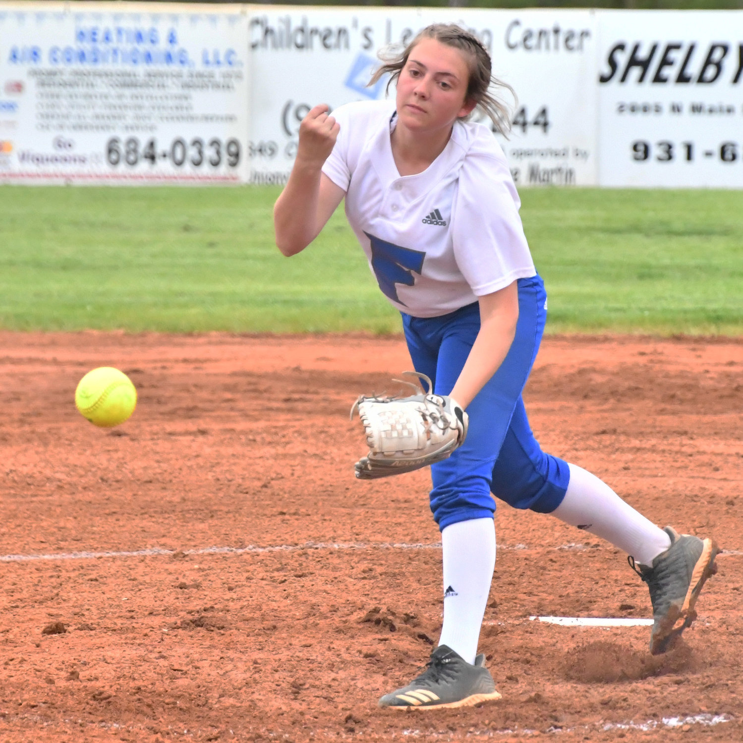 Julie Williams delivers a pitch for the Lady Rockets.
