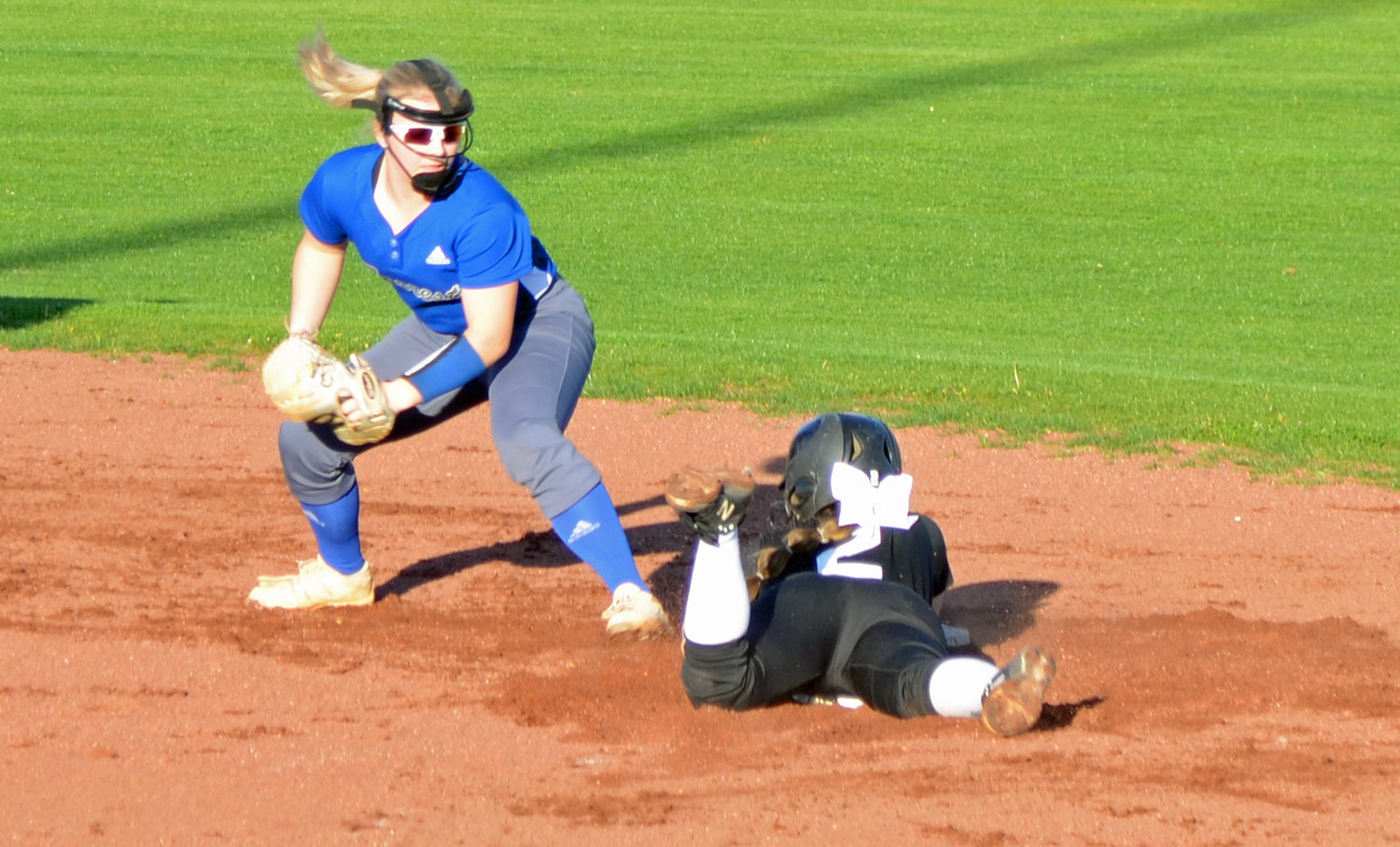 Cornersville’s Emma Ward slides safely in to second base in the first inning.