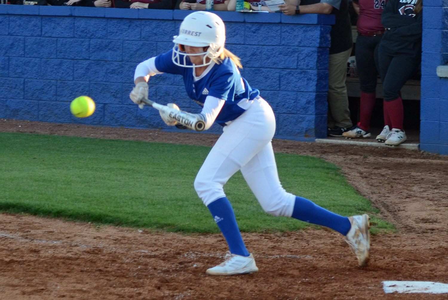 Macyn Kirby lays down a perfect bunt for a base hit in the bottom of the fourth inning.