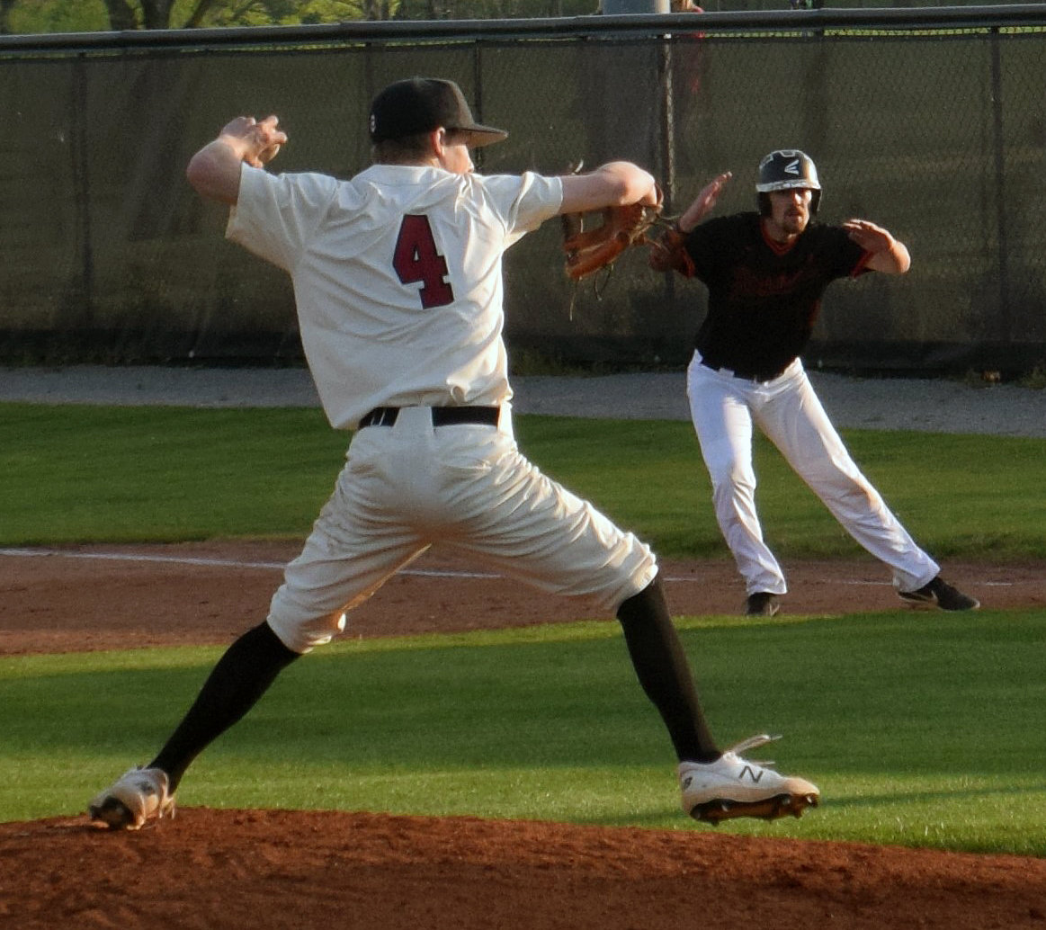 Gage Lovell winds up and delivers a pitch against Richland.