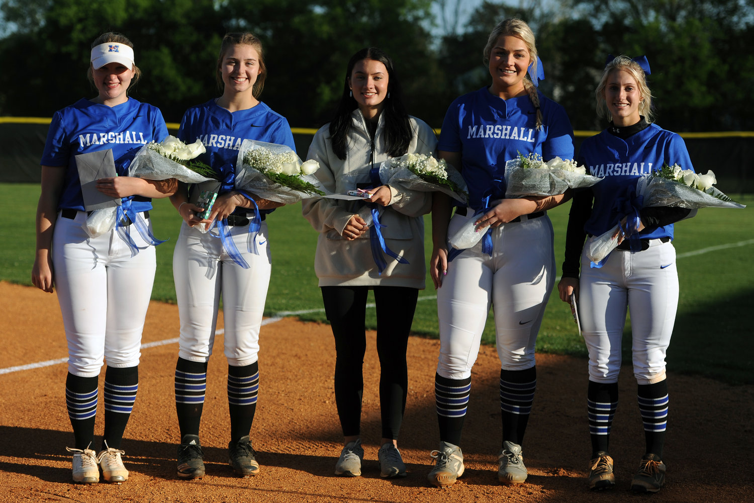 Before Tuesday night’s matchup against Spring Hill, Marshall County honored its five seniors (from left) Ellie Luce, Jessa Lancaster, Mallorie Wooten, Taylor Pickle and Olivia Wooten.