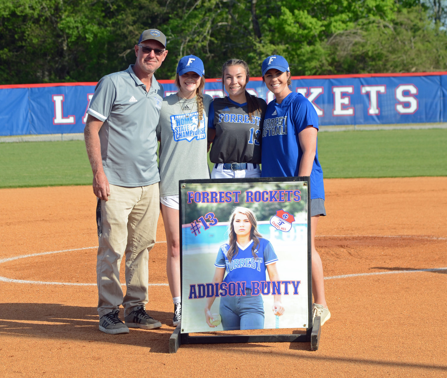 From left are Forrest coaches Ricky Stinnett and Ally Blanton, senior Addison Bunty, and Forrest head coach Shelby Lightfoot.